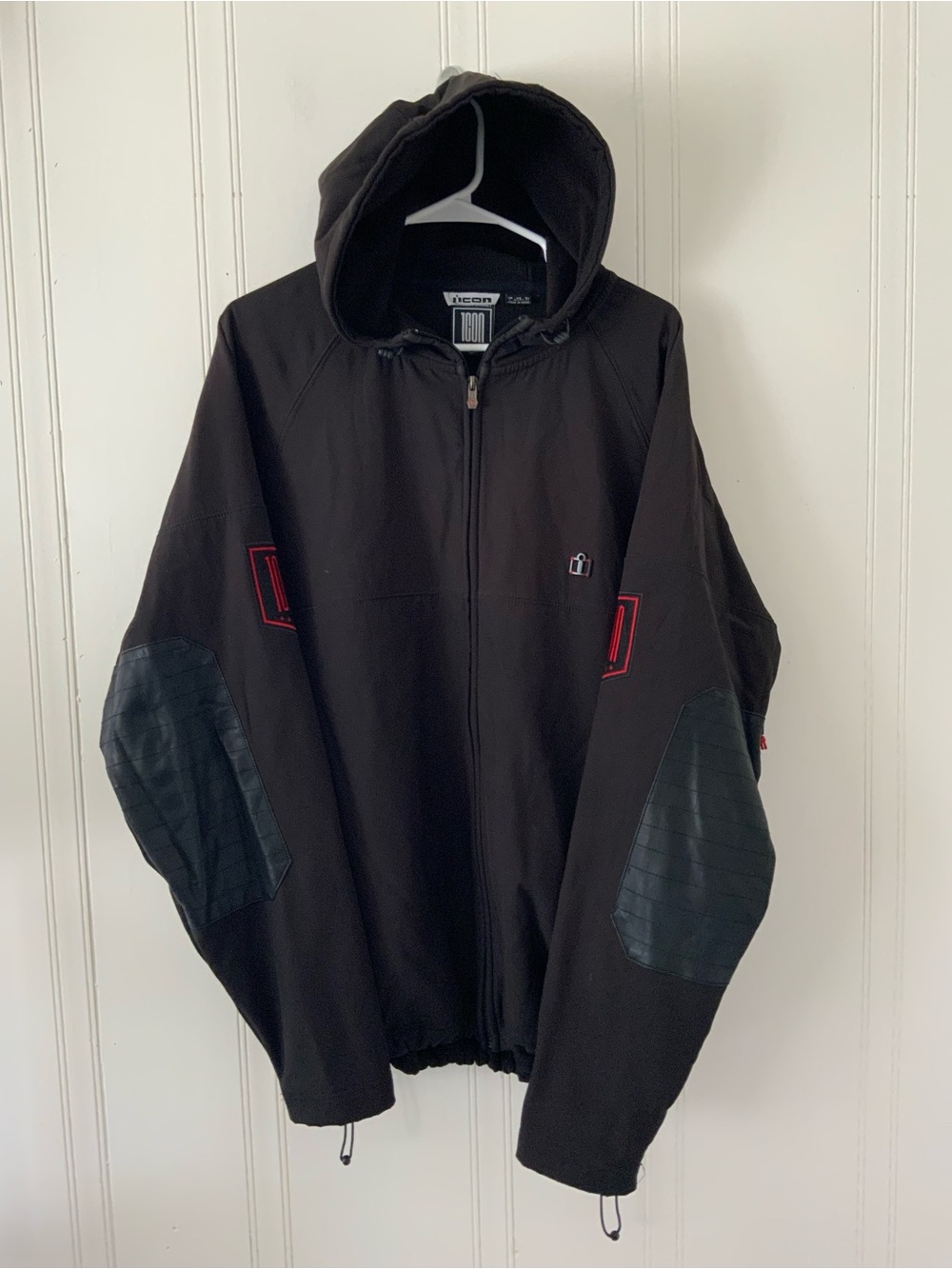 ICON Black Hooded Jacket with Quilted Elbow Panels and Red Accents